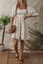 Load image into Gallery viewer, Beige Embroidered Flower Smocked Bust Half Puff Sleeve Empire Waist Textured Flowy Dress | Arrow Boutique | | Arrow Women&#39;s Boutique