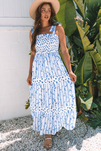 Sky Blue Floral Smocked Tied Straps A-Lined Tiered Maxi Dress | Arrow Boutique | | Arrow Women's Boutique