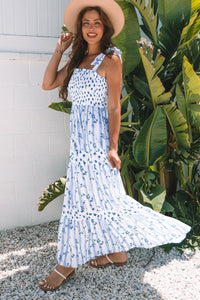 Sky Blue Floral Smocked Tied Straps A-Lined Tiered Maxi Dress | Arrow Boutique | | Arrow Women's Boutique